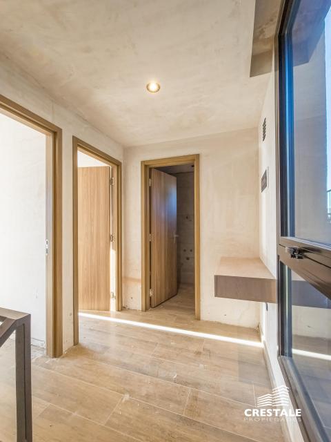 Departamento de pasillo 2 dormitorios en venta Wilde Bis, Rosario. CBU39703 AP4341682 Crestale Propiedades