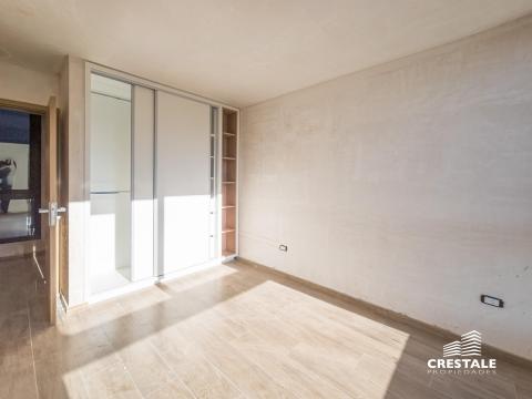 Departamento de pasillo 2 dormitorios en venta Wilde Bis, Rosario. CBU39703 AP4341682 Crestale Propiedades