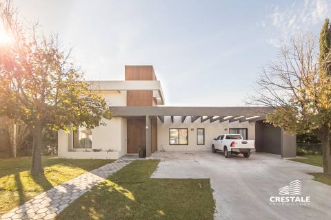 Casa 4 dormitorios en venta Kentucky Club De Campo, Funes. CHO5726490 Crestale Propiedades