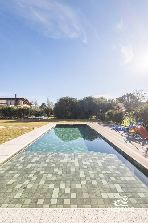 Casa 4 dormitorios en venta Kentucky Club De Campo, Funes. CHO5726490 Crestale Propiedades