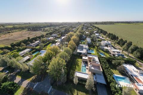 Casa 2 dormitorios en venta Los Álamos Club De Campo, Ibarlucea. CHO6921109 Crestale Propiedades