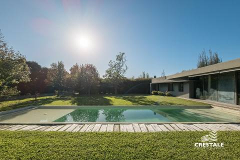 Casa 2 dormitorios en venta Los Álamos Club De Campo, Ibarlucea. CHO6921109 Crestale Propiedades