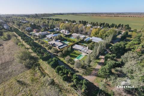 Casa 2 dormitorios en venta Los Álamos Club De Campo, Ibarlucea. CHO6921109 Crestale Propiedades